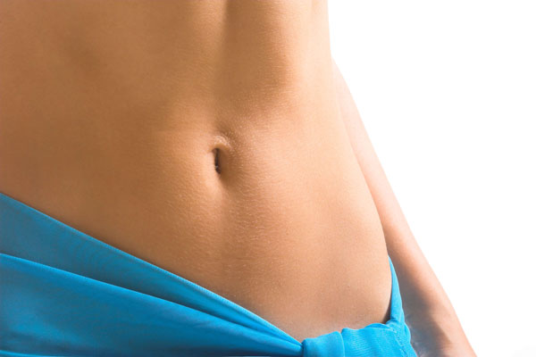 breast reduction and a tummy tuck at the same time